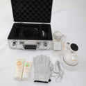 Bioenergetic Meridian Massager kit with multifunction device, gloves, creams, and accessories in silver case.