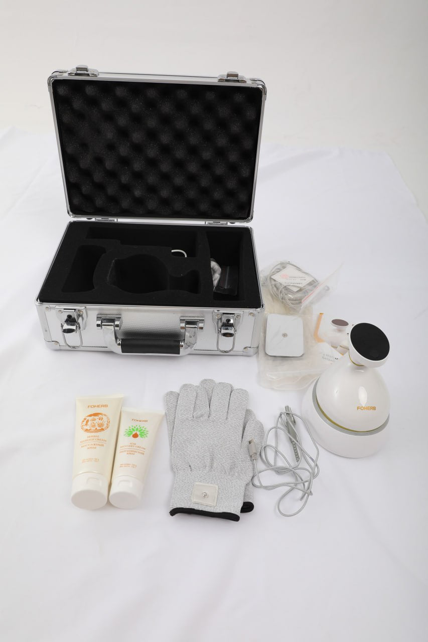 Bioenergetic Meridian Massager kit with multifunction device, gloves, creams, and accessories in silver case.